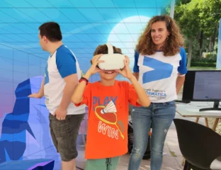 miembros de la ESI UCLM alrededor de un niño con gafas de realidad virtual