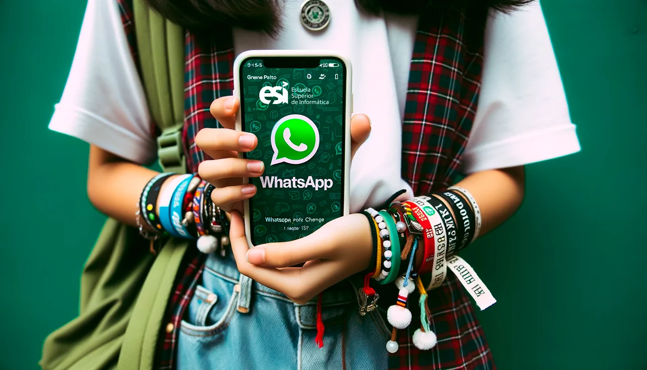 Chica sujetando un teléfono móvil con el logo de whatsapp