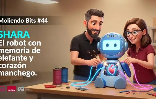 Ramón Hervas y Laura Villa manipulando un robot