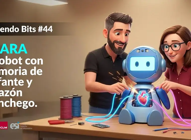 Ramón Hervas y Laura Villa manipulando un robot