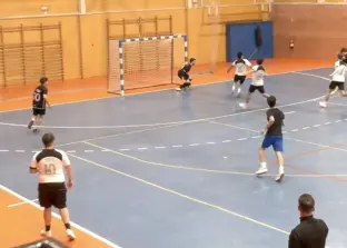 Jugadores de la ESI disputando la final de fútbol Sala 2026